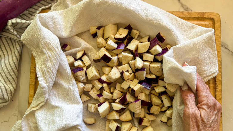 eggplant cubes in towel