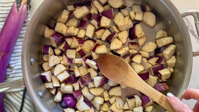 adding oil to pan