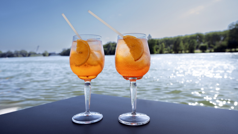 Aperol spritzes with a seaside view