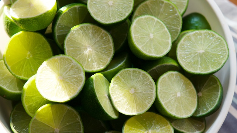 bowl of limes in half