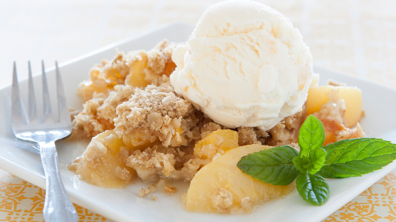 Peach crisp with vanilla ice cream