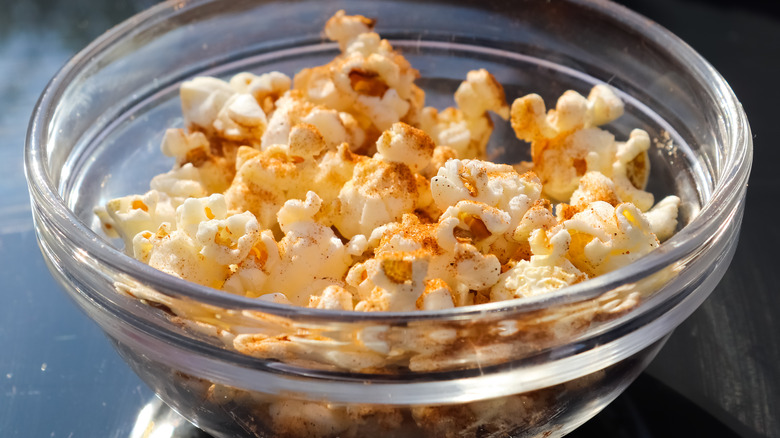 Spiced popcorn in glass bowl