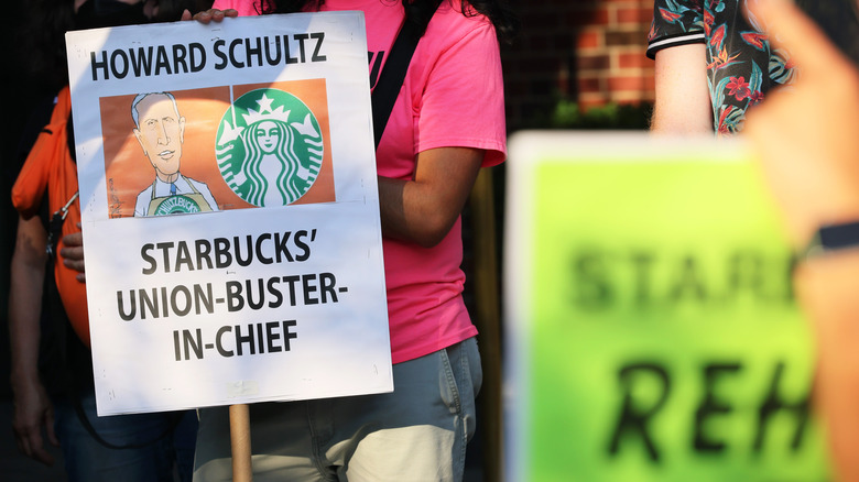 Picket signs at Starbucks rally