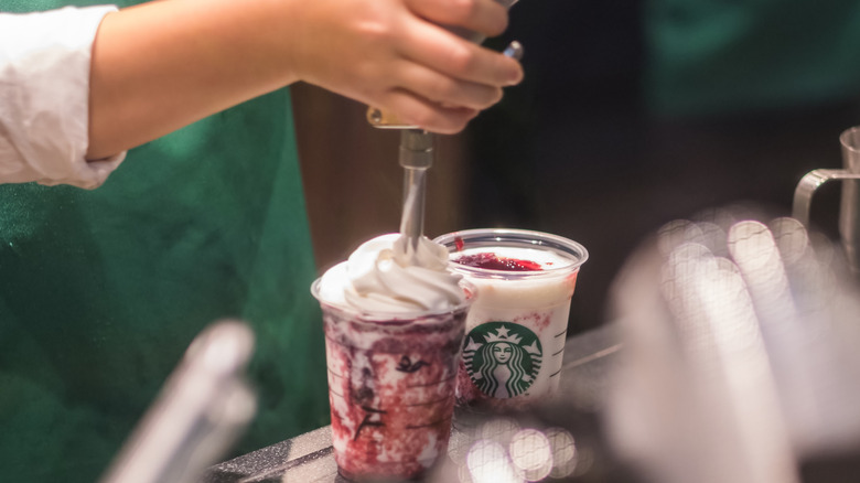 customized Starbucks beverages made by a barista