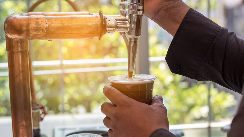 nitro cold brew being poured
