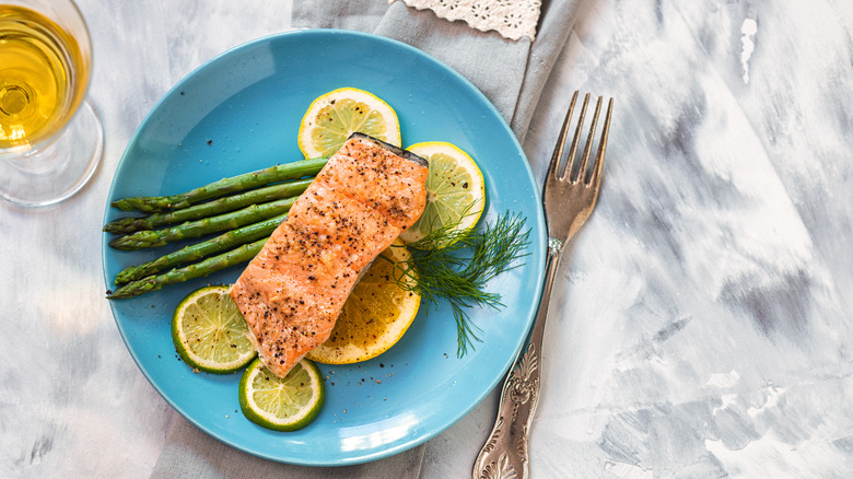 Salmon and asparagus on plate