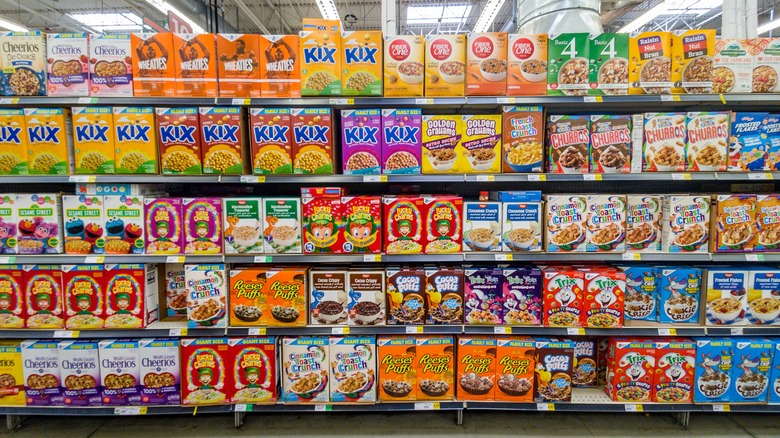 Boxes of cereal on shelves at store