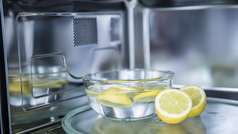 sliced lemons in water in microwave