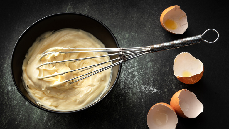 bowl of mayo with whisk