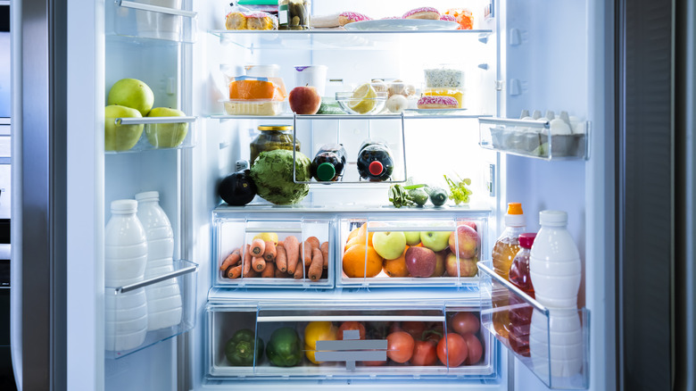 open refrigerator with produce