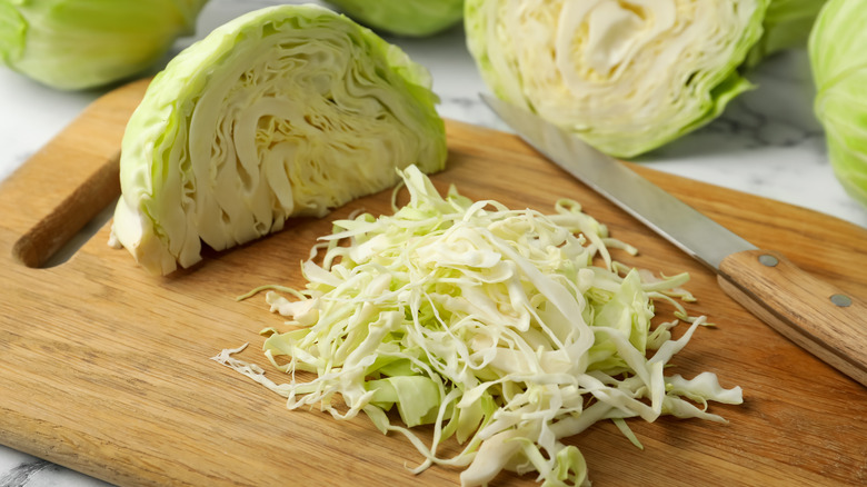 cabbage and carrots in a glass bowl