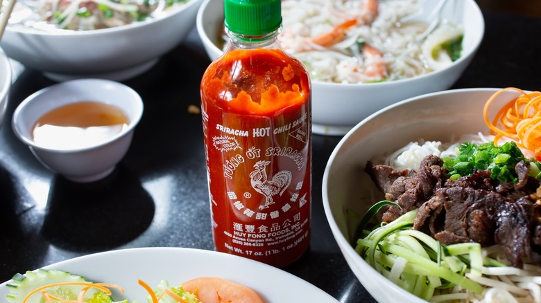 Sriracha sauce and noodles