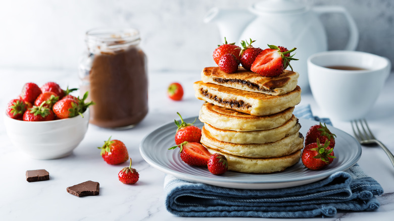 pancakes with Nutella and strawberries