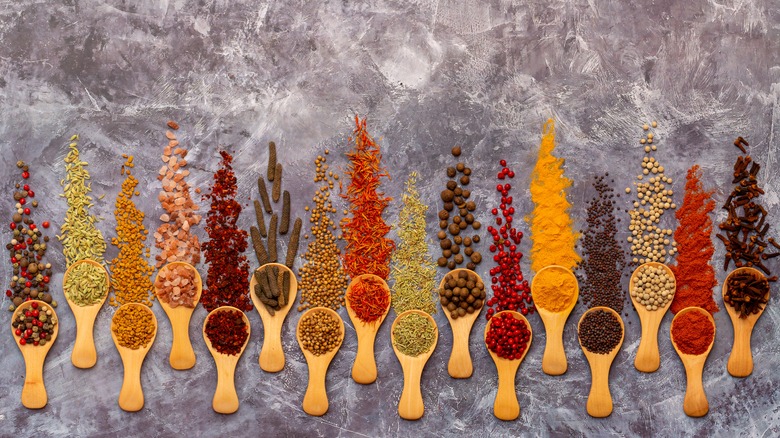 Spices in wooden spoons