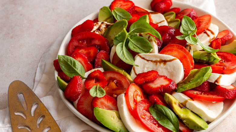 strawberry-avocado caprese salad on plate 