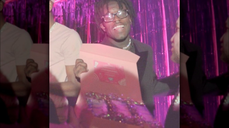 Lil Uzi Vert opening a box of Strawberry Milkshake Pop-Tarts