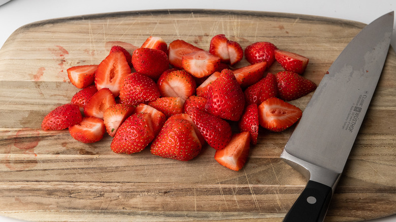 strawberries on cutting board 