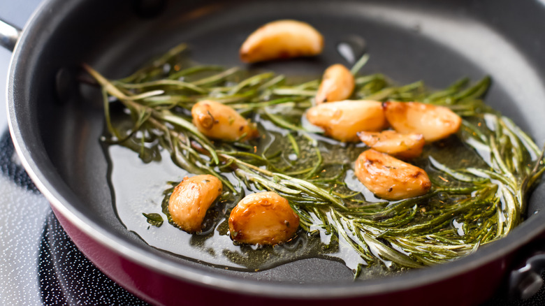 Garlic and rosemary in olive oil