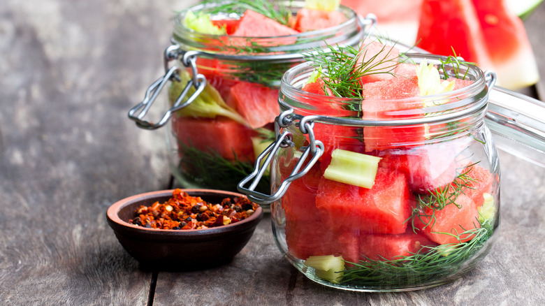 melon in jar with herbs