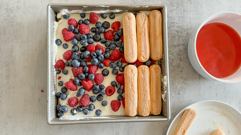 layering summer berry tiramisu