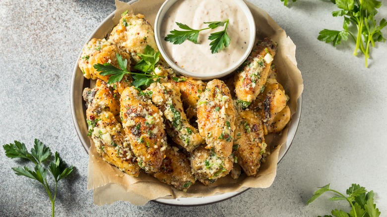 A plate of garlic parmesan wings