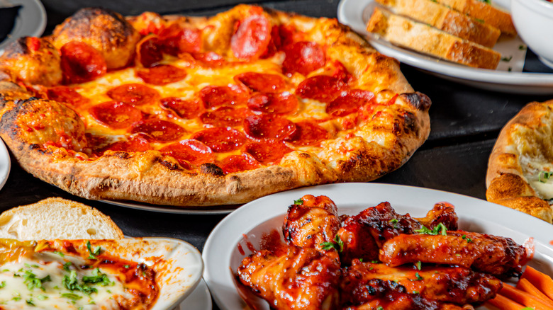 Pizza, wings, and other party foods