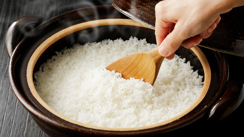 sushi rice being stirred 