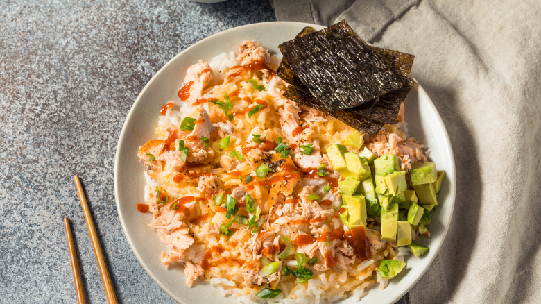 salmon rice bowl with avocado 