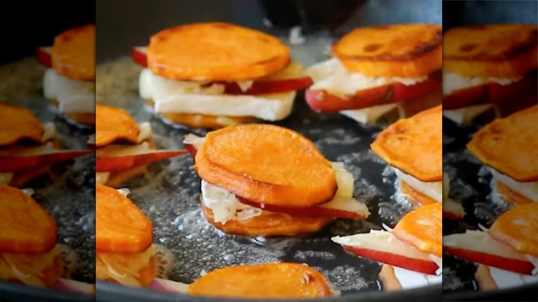 person cutting pears