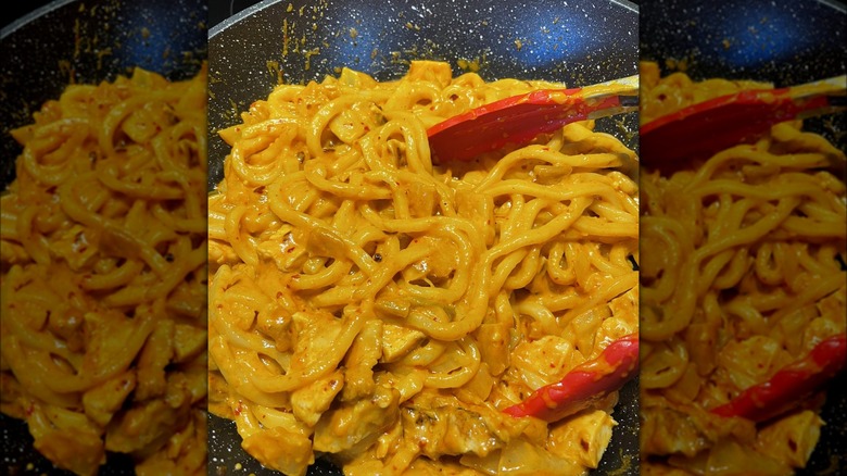 Kimchi udon carbonara in pan