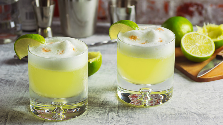 Mezcal sours in cocktail glasses