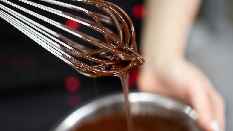 Melted chocolate on whisk