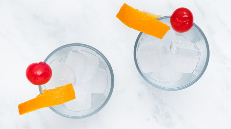 glasses with ice and fruit garnishes