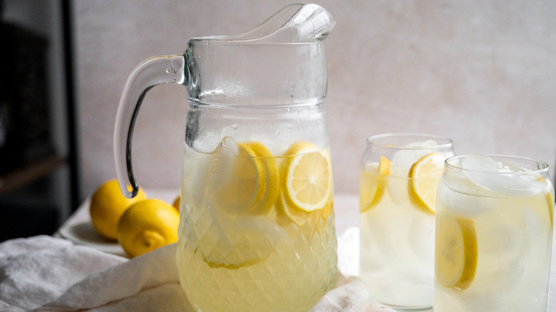 simple and sweet lemonade in a pitcher 