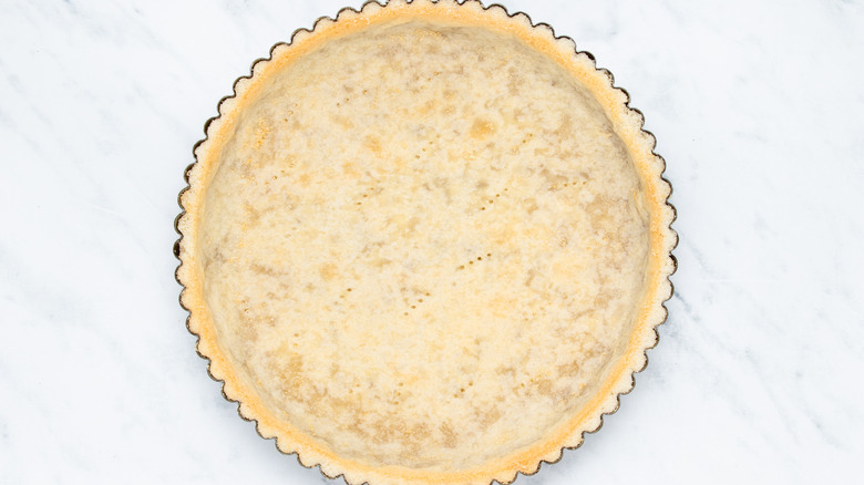 cooked pie crust in tin