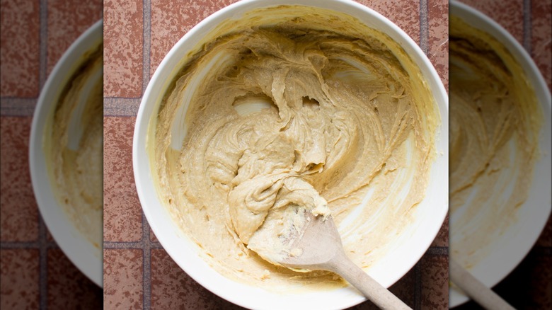 Butter and brown sugar mixed in a bowl