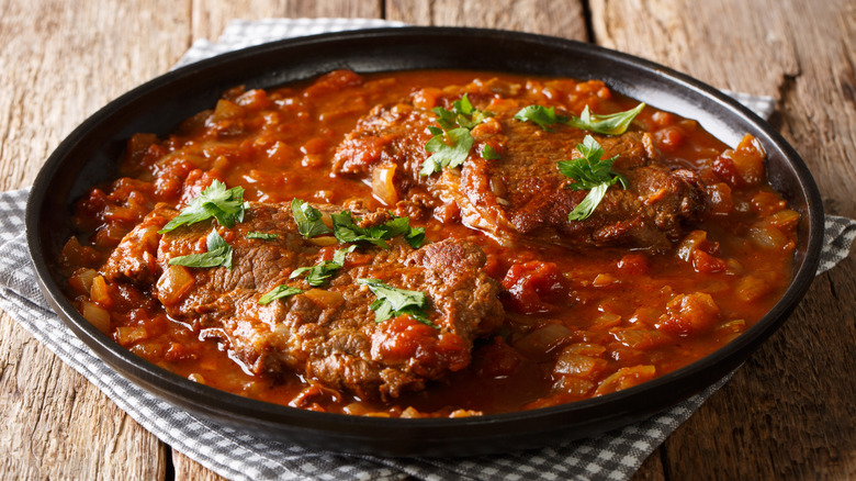 swiss steak in skillet on napkin