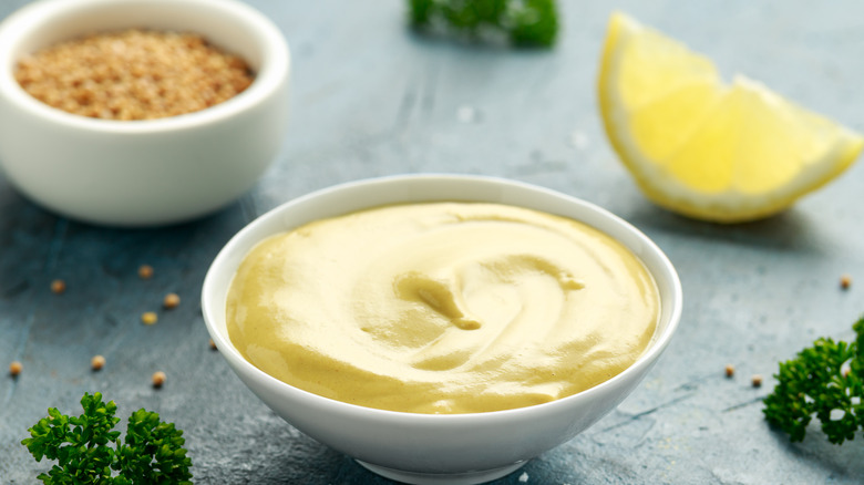 ceramic bowl filled with dijon mustard