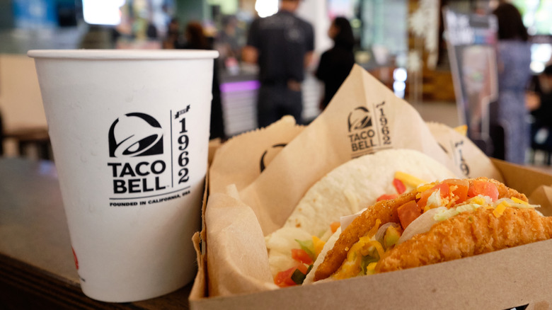 Taco Bell cup and food on tray