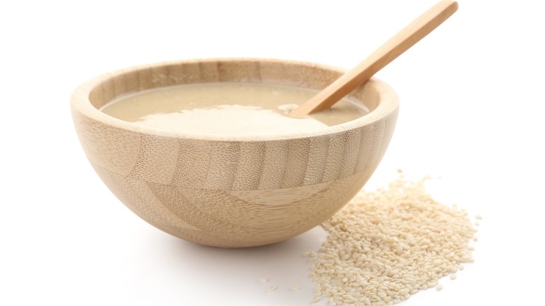 Tahini in a wooden bowl