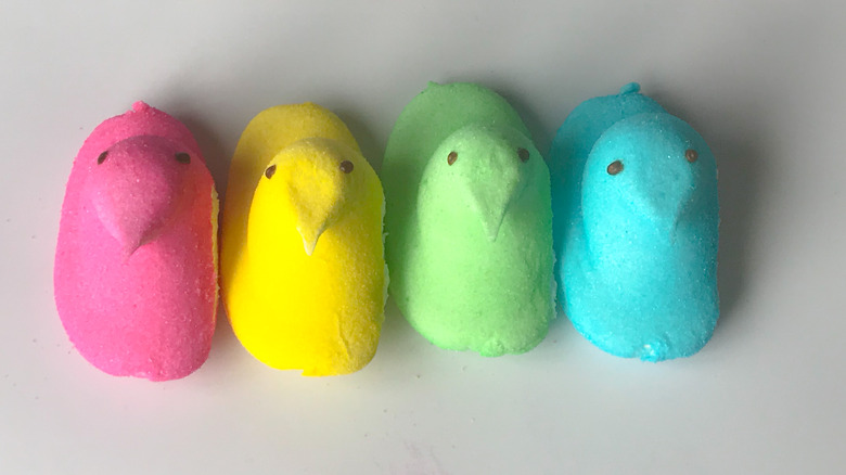 four peeps in different colors