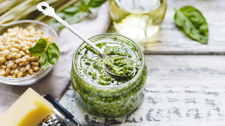 Jar of pesto with spoon