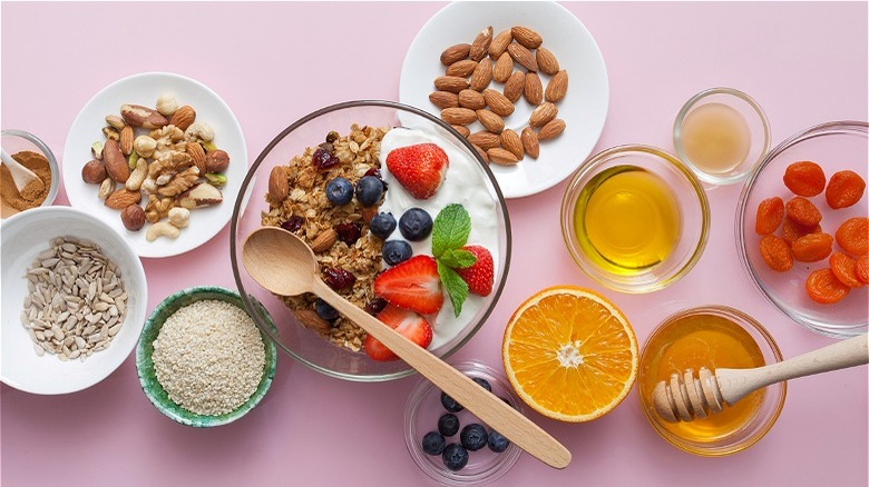 Bowl of granola and extra ingredients