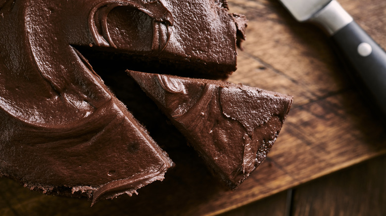 slice removed from chocolate cake