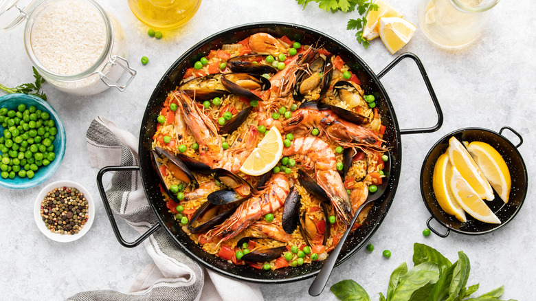overhead of paella in pan on table