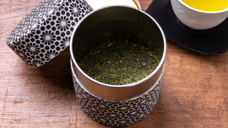 sencha tea leaves in tin container