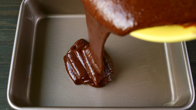 Chocolate cake batter in sheet pan 