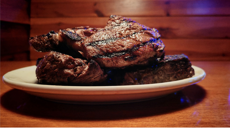 Texas Roadhouse bone-in ribeye on plate