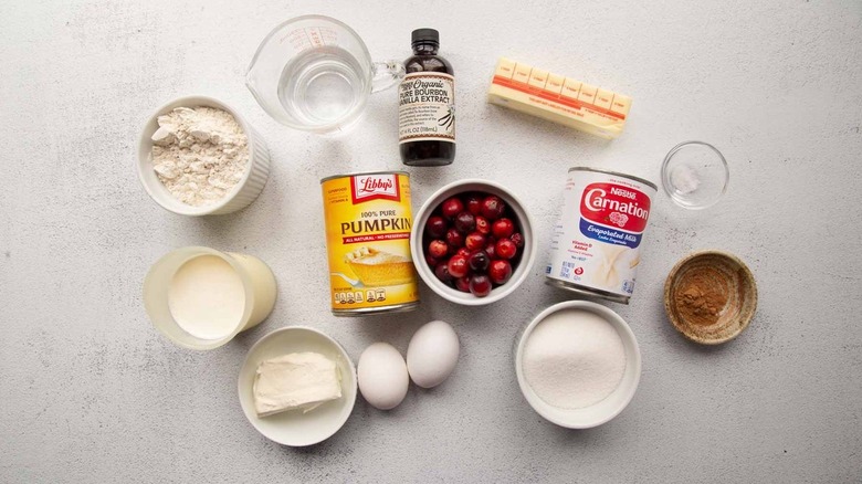 Cranberries, pumpkin puree, and assorted baking ingredients