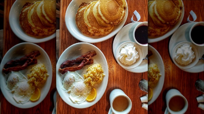 Breakfast with pancakes, bacon, eggs, hashbrown, casserole